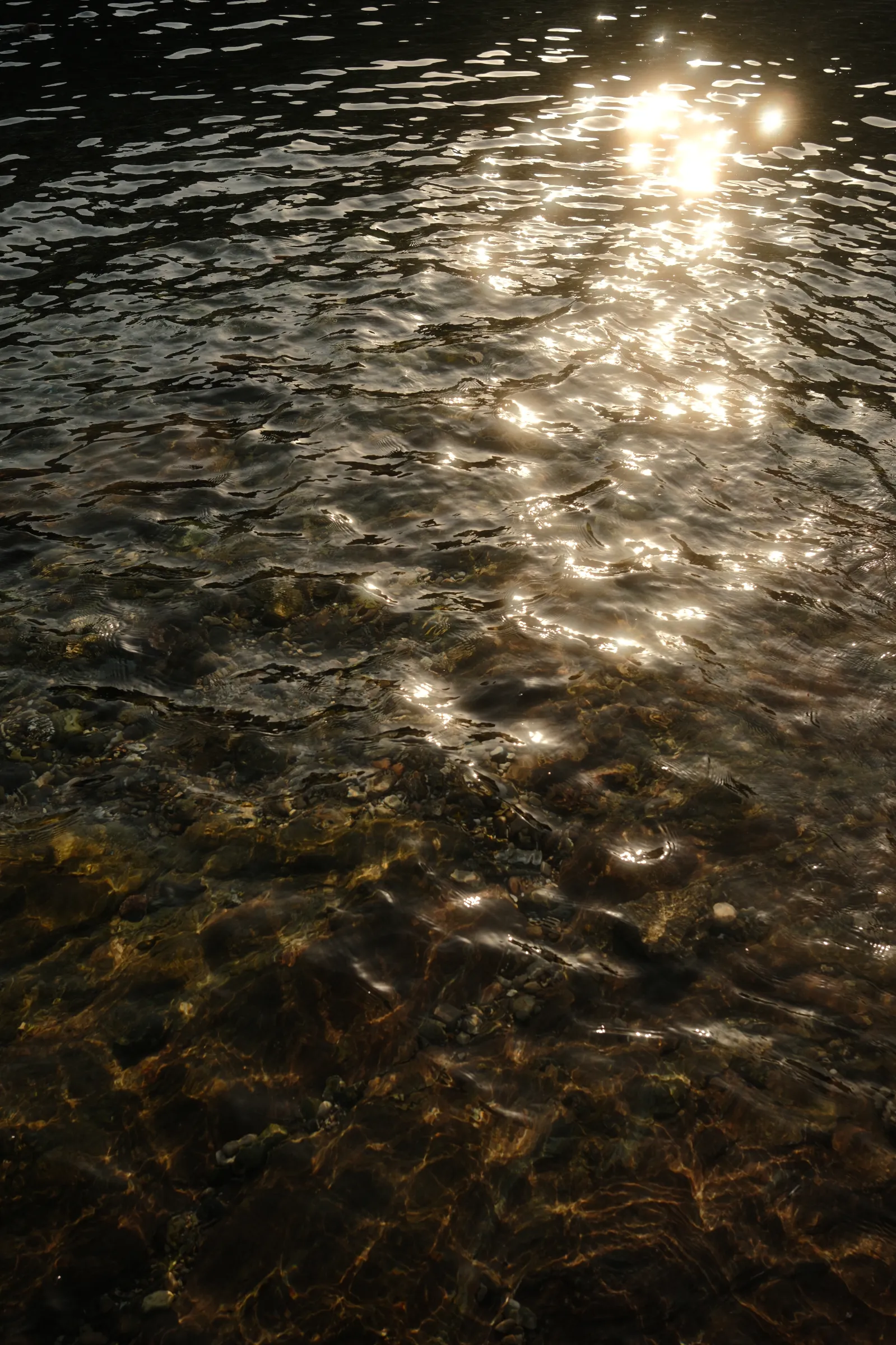 Sun reflection on water in isola bella, Taormina - Essenza Fujifilm Film recipe