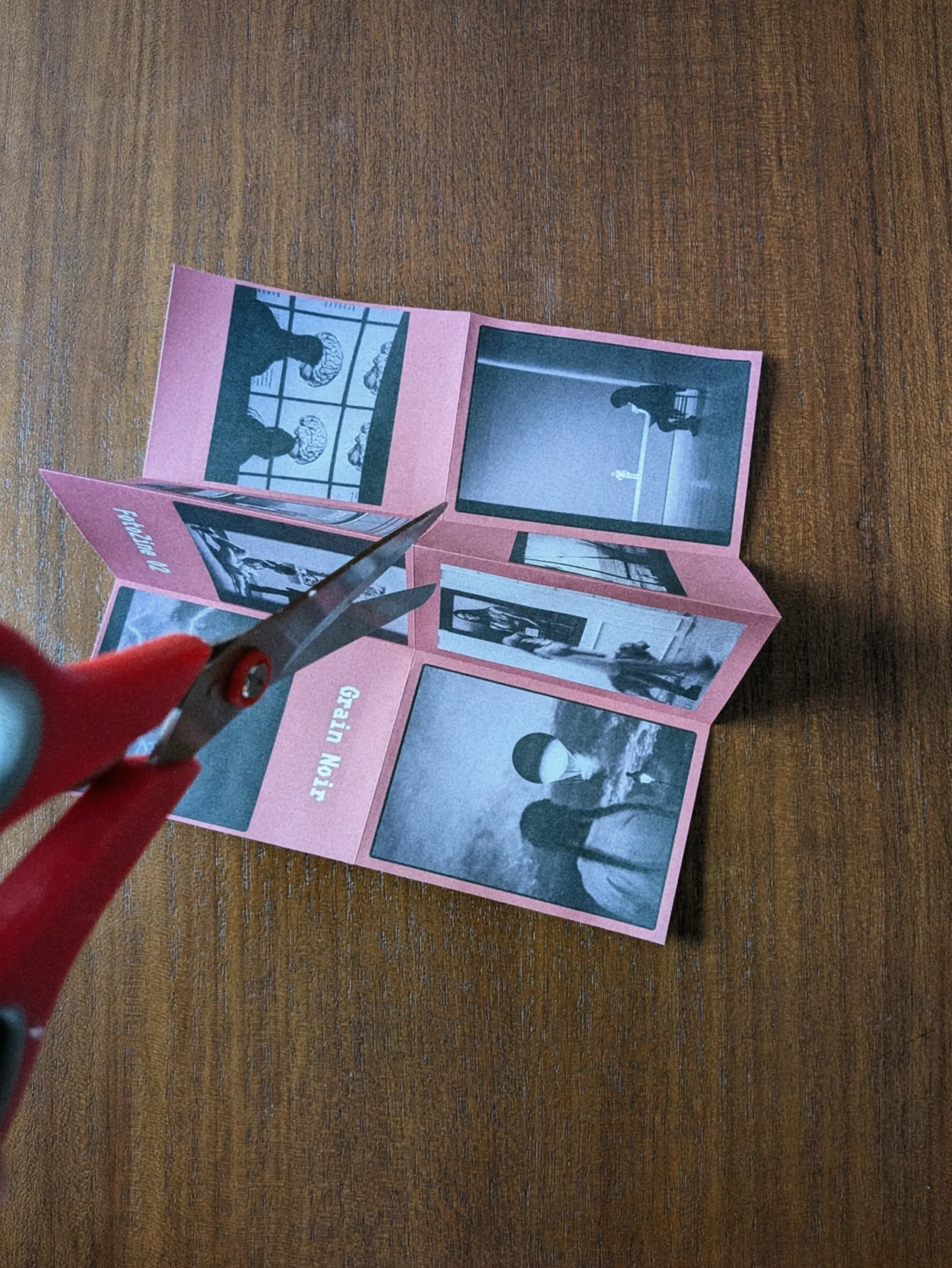 Cutting the A4 paper to create the mini zine - FotoZine Lab