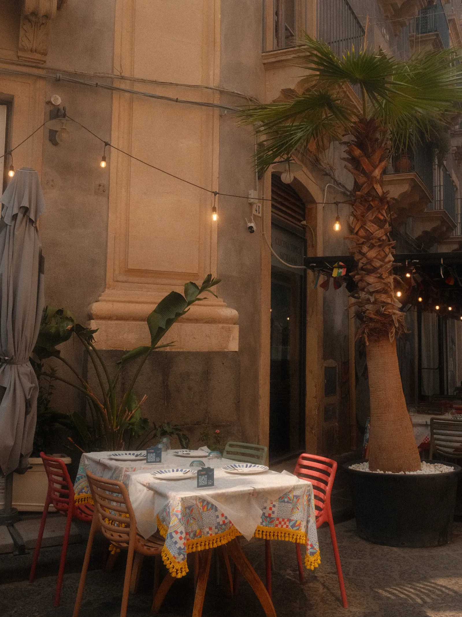 A restaurant in the streets of Catania, Sicily - Summer Chrome fujifilm film recipe