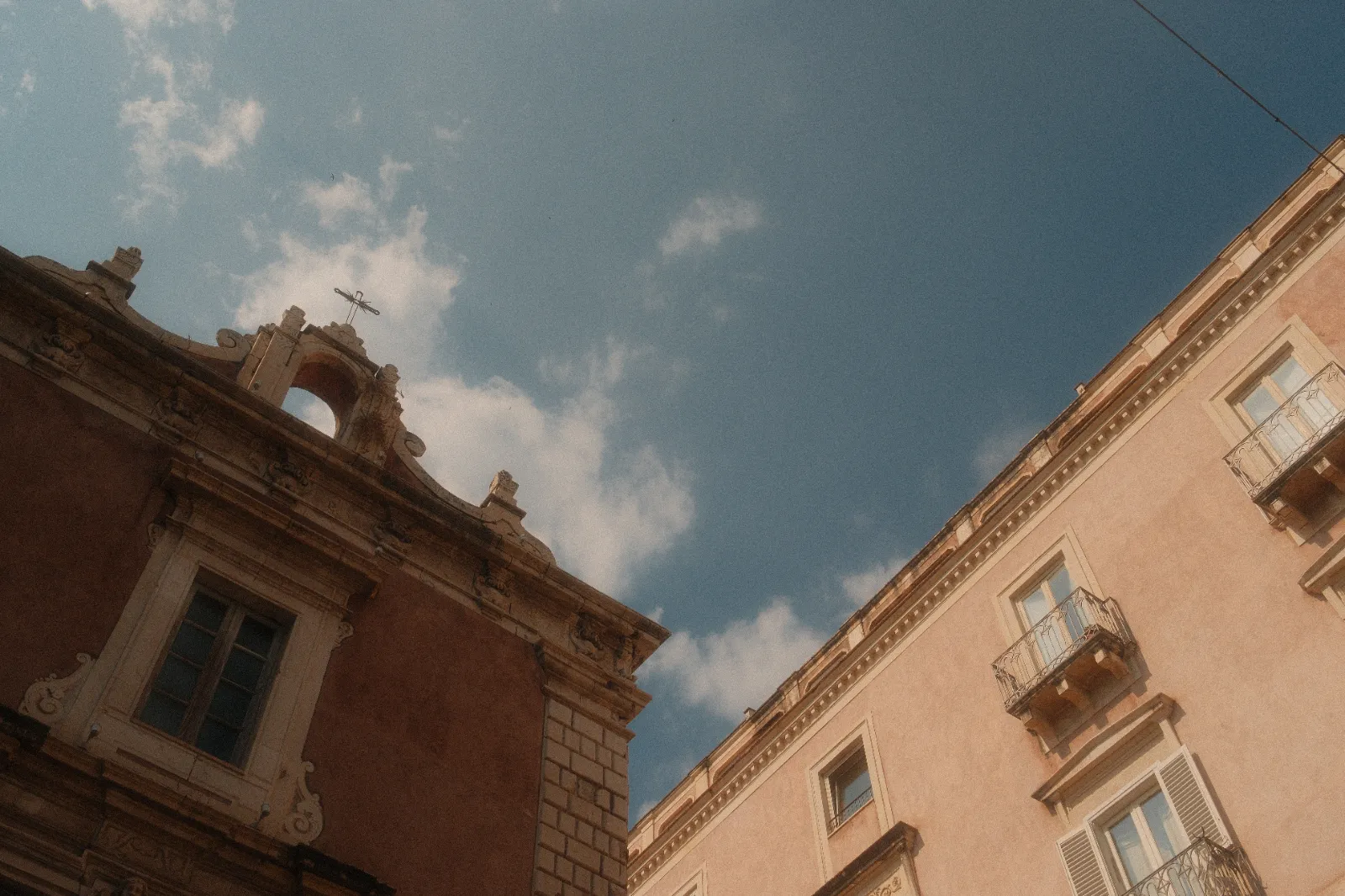 A corner street in Catania, Sicily - Summer Chrome fujifilm film recipe