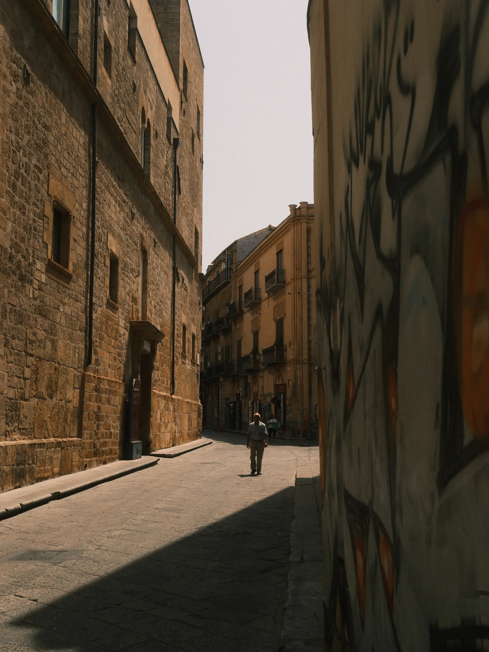 A man walking in the streets of Palermo, Sicily