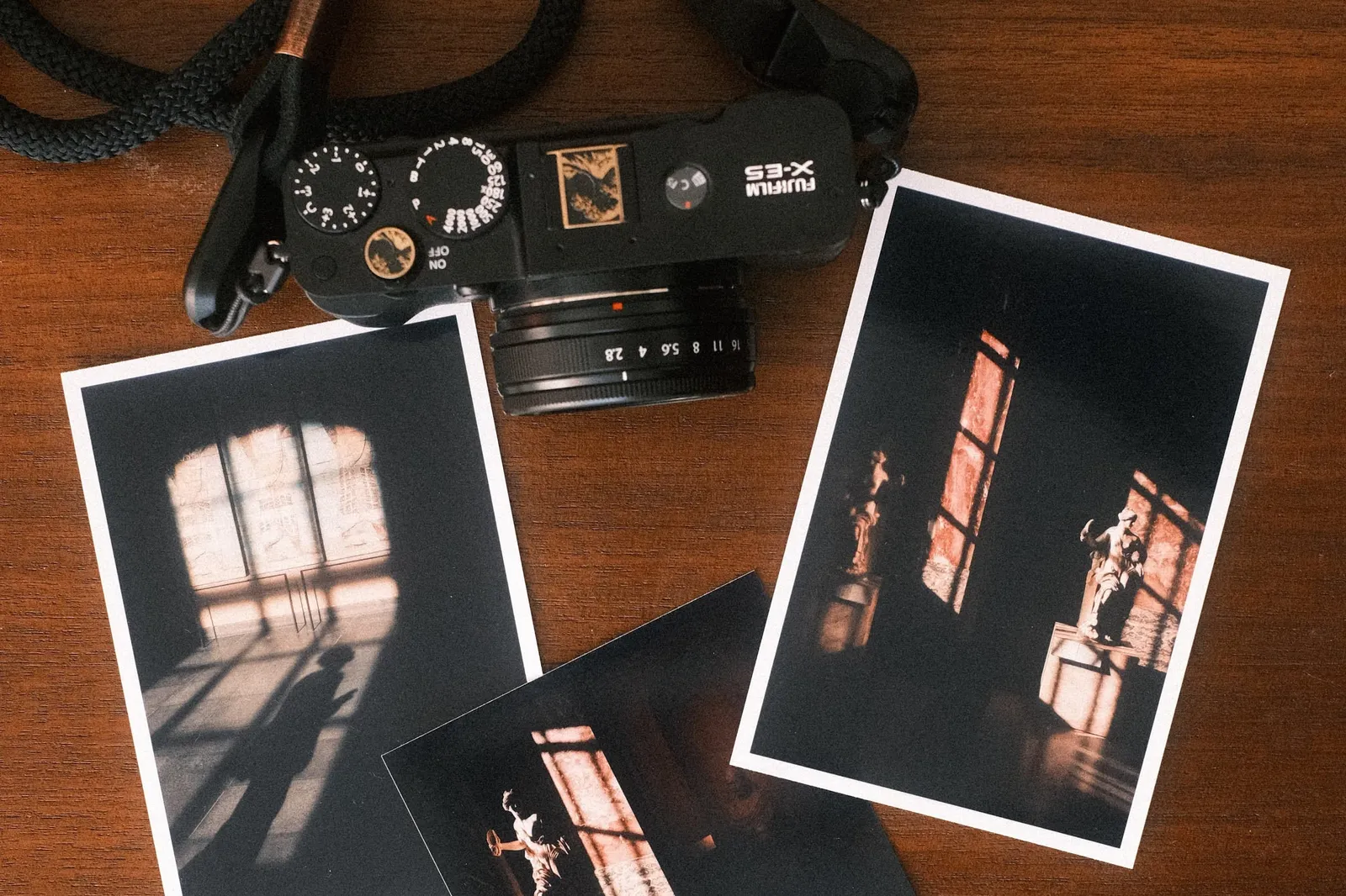 Fujifilm X-E5 and 3 prints from the Canon Selphy CP1500.